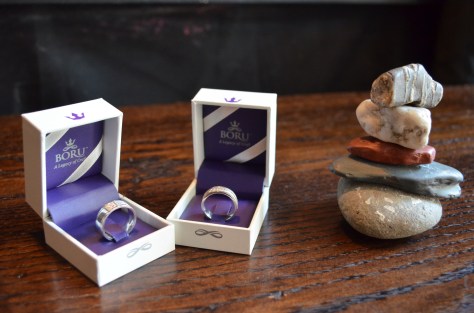 The rings, bearing Celtic symbols of love and promise.